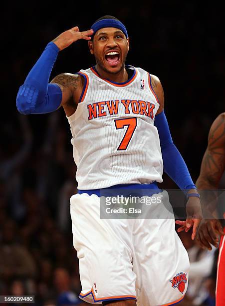 Carmelo Anthony of the New York Knicks celebrates his three point shot in the fourth quarter against the Atlanta Hawks on January 27, 2013 at Madison...