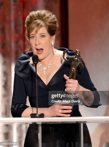 Actress Phyllis Logan accepts the award for Outstanding Performance by an Ensemble in a Drama Series for 'Downtown Abbey' onstage during the 19th...