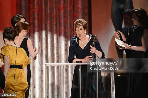 Actress Phyllis Logan accepts the award for Outstanding Performance by an Ensemble in a Drama Series for 'Downtown Abbey' onstage during the 19th...