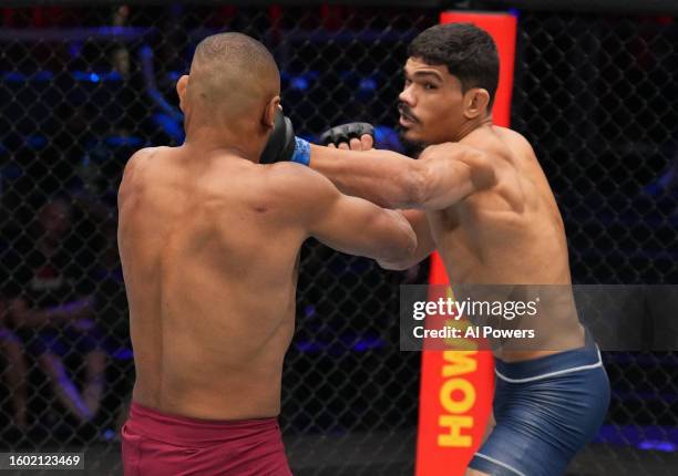 Lucas Fernando of Brazil punches Cesar Almeida of Brazil in a middleweight fight during Dana White's Contender Series season seven, week one at UFC...