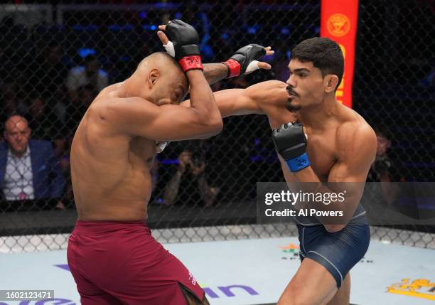 Lucas Fernando of Brazil punches Cesar Almeida of Brazil in a middleweight fight during Dana White's Contender Series season seven, week one at UFC...