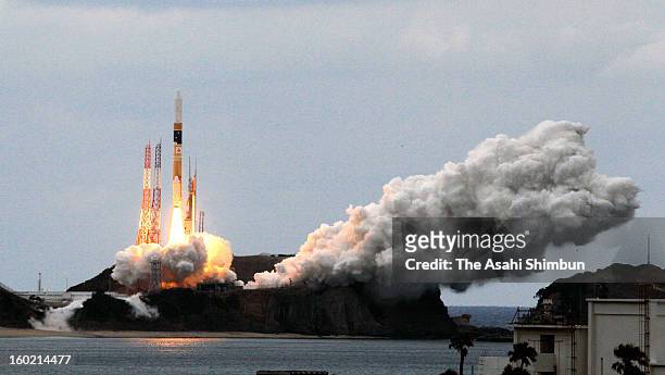 The H2A-22 rocket, developed by The Japan Aerospace Exploration Agency and Mitsubishi Heavy Industries Ltd. Lifts off from the launch pad at JAXA's...