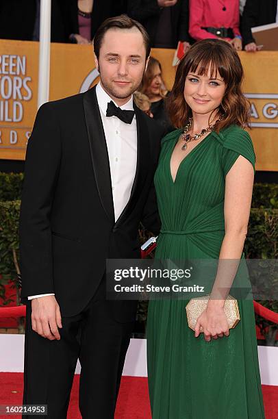 Actors Vincent Kartheiser and Alexis Bledel arrive at the 19th Annual Screen Actors Guild Awards held at The Shrine Auditorium on January 27, 2013 in...