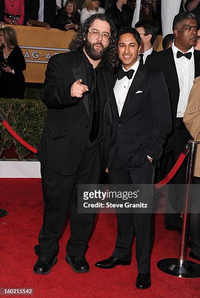 Actor Judah Friedlander and actor Danny Pudi arrive at the 19th Annual Screen Actors Guild Awards held at The Shrine Auditorium on January 27, 2013...