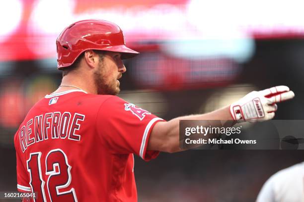 Hunter Renfroe of the Los Angeles Angels celebrates on third base after hitting a two RBI double against the San Francisco Giants during the first...