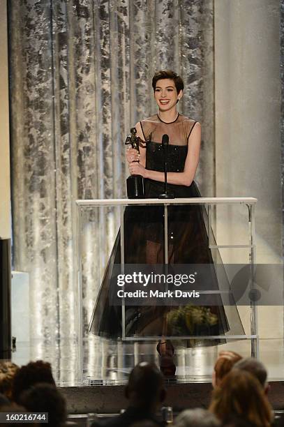 Actress Anne Hathaway accepts the award onstage for Outstanding Performance by a Female Actor in a Supporting Role for 'Les Miserables' during the...