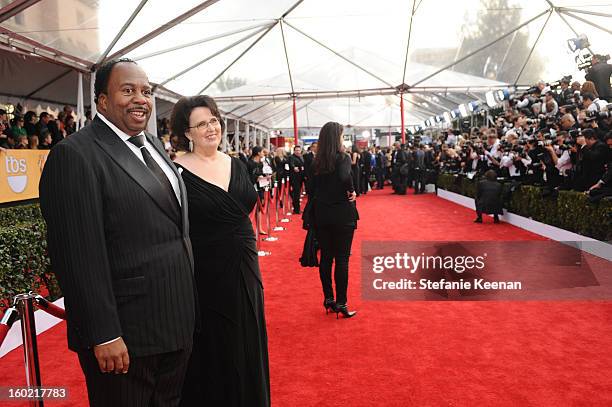 Actors Leslie David Baker and Phyllis Smith attend the 19th Annual Screen Actors Guild Awards at The Shrine Auditorium on January 27, 2013 in Los...