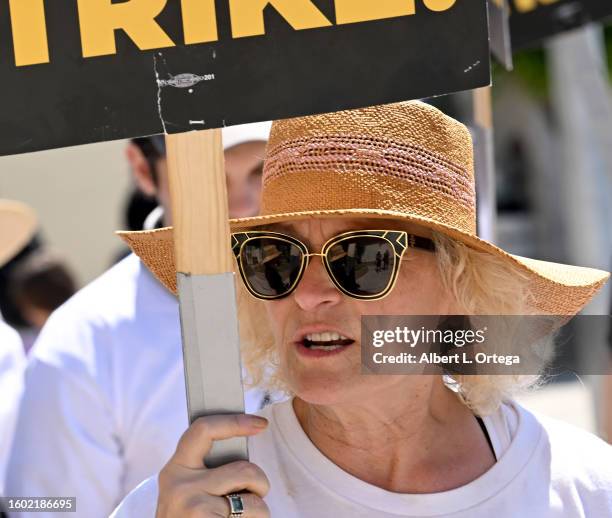 Elizabeth Dennehy walks the picket line at Paramount Studios on August 08, 2023 in Los Angeles, California. Members of SAG-AFTRA and WGA have both...