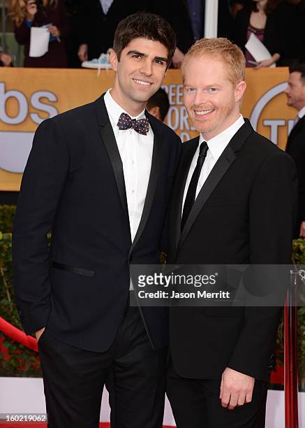 Actor Jesse Tyler Ferguson and Justin Mikita attend the 19th Annual Screen Actors Guild Awards at The Shrine Auditorium on January 27, 2013 in Los...