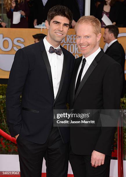 Actor Jesse Tyler Ferguson and Justin Mikita attend the 19th Annual Screen Actors Guild Awards at The Shrine Auditorium on January 27, 2013 in Los...