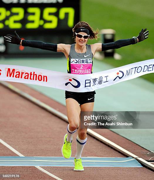 Tetyana Gamera-Shmyrko of Ukraine celebrates winning the 32nd Osaka International Women's Marathon at Nagai Stadium on January 27, 2013 in Osaka,...
