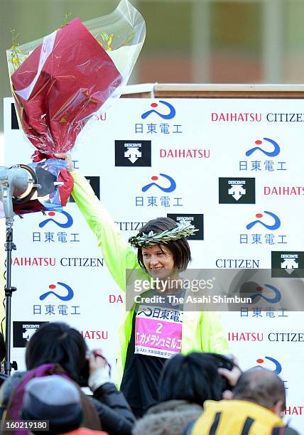 Tetyana Gamera-Shmyrko of Ukraine poses for photographs after the 32nd Osaka International Women's Marathon at Nagai Stadium on January 27, 2013 in...