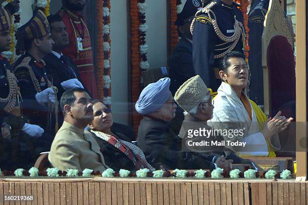 Vice President M Hamid Ansari, chief guest King of Bhutan, Jigme Khesar Namgyel Wangchuck, Prime Minister Manmohan Singh enjoy watching an air show...