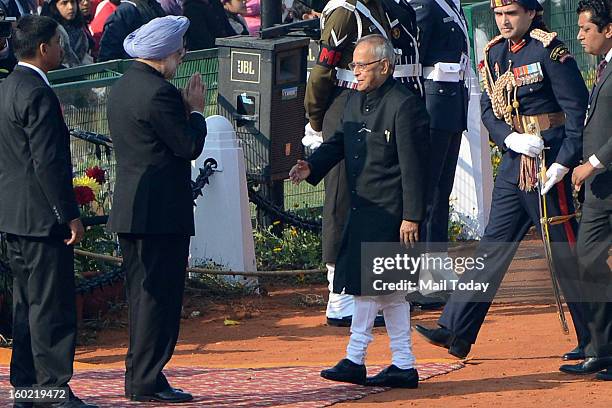 Manmohan Singh and Pranab Mukherjee during 64th Republic Day celebrations in New Delhi on Saturday.