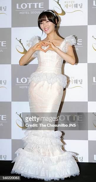 Sun of Wondergirls poses for photographs before her wedding at lotte hotel on January 26, 2013 in Seoul, South Korea.