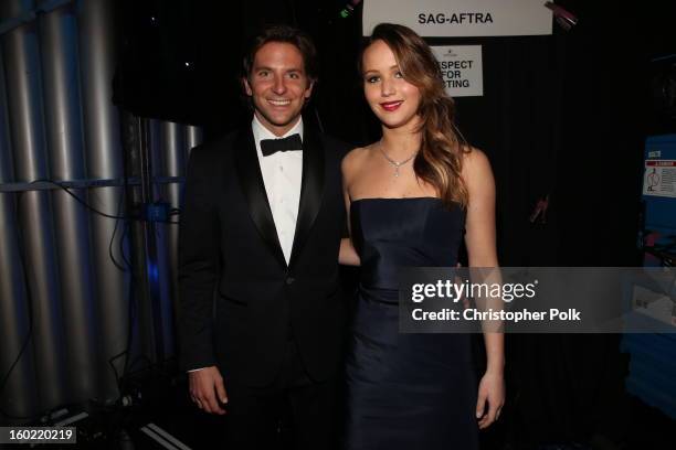 Actors Jennifer Lawrence and Bradley Cooper attend the 19th Annual Screen Actors Guild Awards at The Shrine Auditorium on January 27, 2013 in Los...