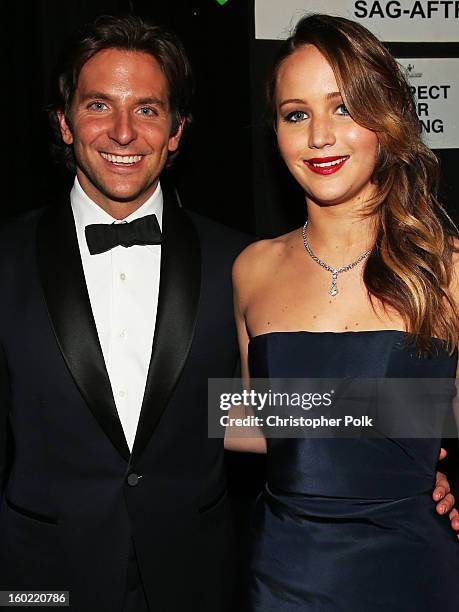 Actors Bradley Cooper and Jennifer Lawrence attend the 19th Annual Screen Actors Guild Awards at The Shrine Auditorium on January 27, 2013 in Los...