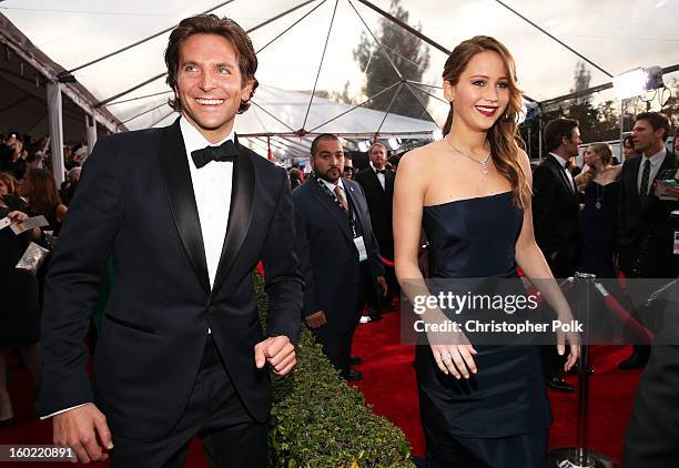 Actors Bradley Cooper and Jennifer Lawrence attend the 19th Annual Screen Actors Guild Awards at The Shrine Auditorium on January 27, 2013 in Los...