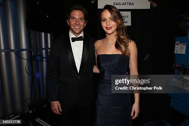 Actors Bradley Cooper and Jennifer Lawrence attend the 19th Annual Screen Actors Guild Awards at The Shrine Auditorium on January 27, 2013 in Los...