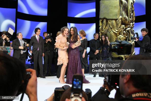 French actress Marion Cotillard and Tunisian actress Hafsia Herzi pose during the 33rd Nuit des Cesar, France's top, movie awards, on February 22,...