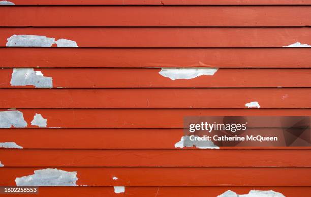 brick red wood siding with paint peeling - painted brick house stock pictures, royalty-free photos & images