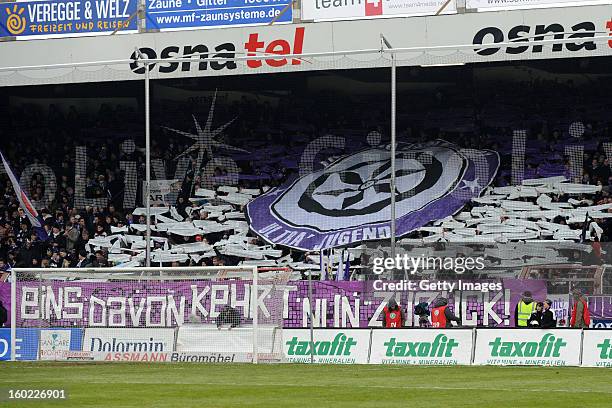 Supporters of Osnabrueck cheer their team during the Third league match between VfL Osnabrueck and Karlsruher SC at Osnatel Arena on January 26, 2013...