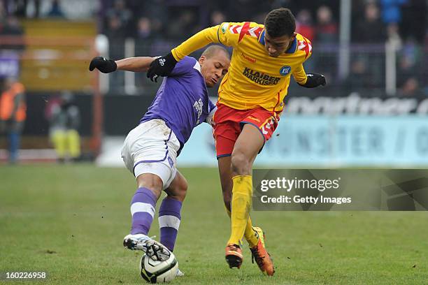 David Pisot of Osnabrueck challenges Kevin Akpoguma of Karlsruhe during the Third league match between VfL Osnabrueck and Karlsruher SC at Osnatel...