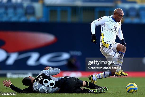 El-Hadji Diouf of Leeds is tackled by Kyle Walker of Spurs during the FA Cup with Budweiser Fourth Round match between Leeds United and Tottenham...
