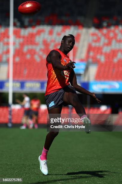 Mabior Chol during the Gold Coast Suns AFL training session at Heritage Bank Stadium on August 09, 2023 in Gold Coast, Australia.
