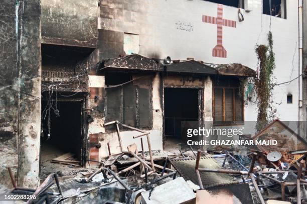 View of a burnt church on the outskirts of Faisalabad on August 16 following an attack by Muslim men after a Christian family was accused of...
