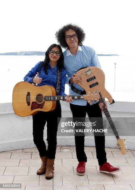 Indonesian band musicians Endah N Rhesa pose during a photocall as part of the music world's largest annual trade fair, Midem, on January 28, 2013 in...