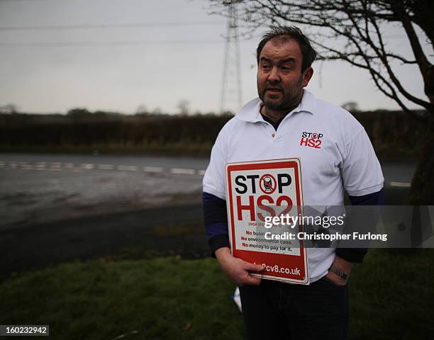 Joe Rukin from the Stop the HS2 Campaign talks to the media near to the planned location of the new HS2 high speed rail link as it passes by the...