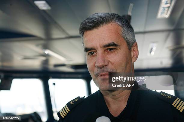 The Captain of the French military ship and helicopter carrier 'Le Dixmude', Guillaume Goutayi, on January 28, 2013 in Dakar harbour, during the...