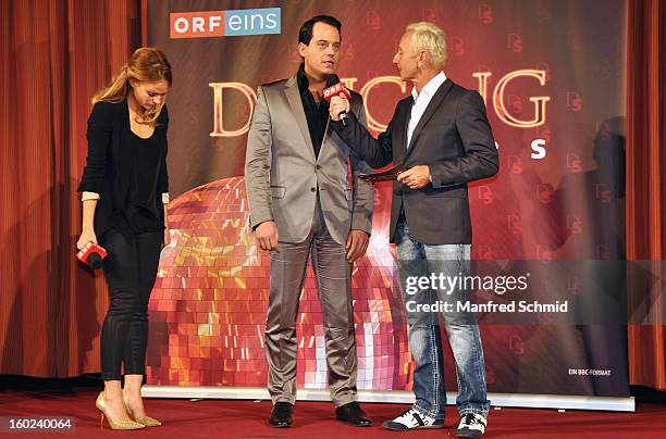 Mirjam Weichselbraun and Klaus Eberhartinger present Gregor Glanz as a contestant at a press conference during the eighth season of TV show 'ORF...