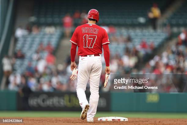 Shohei Ohtani of the Los Angeles Angels walks back to second base during the first inning of a game against the San Francisco Giants at Angel Stadium...