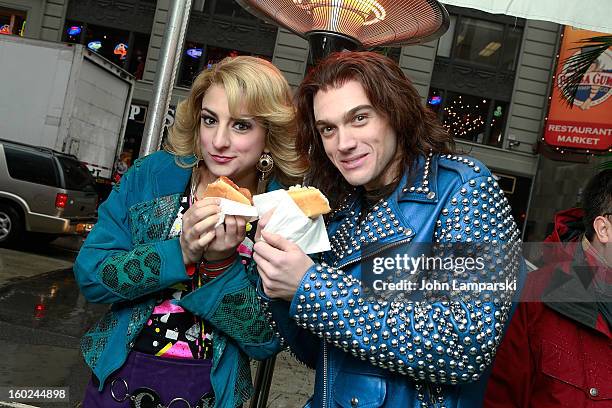 Actors Tessa Alves and Justin Matthew Sargent of Rock of Ages attend the Norwegian Warming Station launch in Times Square on January 28, 2013 in New...