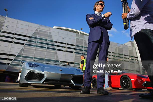 The President and CEO of Lamborghini Stephan Winkelmann stands near the new Lamborghini Aventador LP700-4 Roadster at the Miami International Airport...