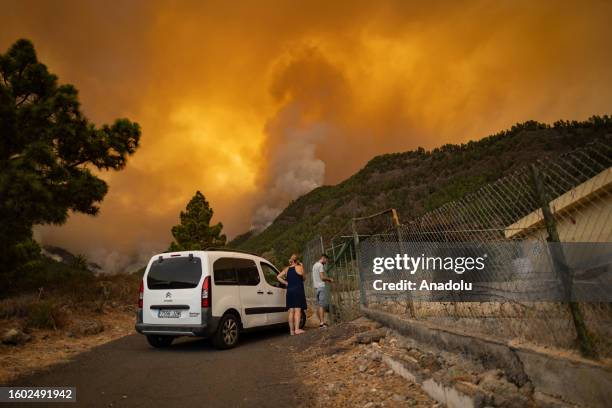 Residents flee as the wildfires get out of control at the municipality of Candelaria in Tenerife, Canary Islands, Spain on August 16, 2023. The level...