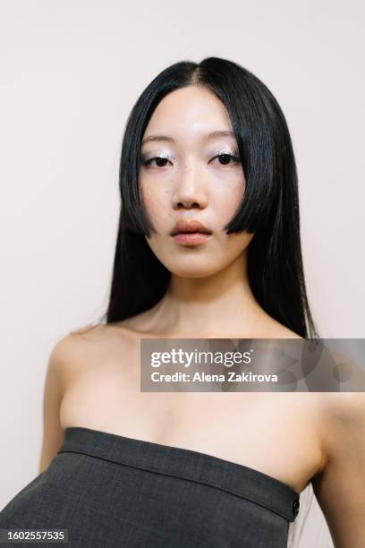 Model poses backstage at the Remain show during the Copenhagen Fashion Week Spring/Summer 2024 on August 08, 2023 in Copenhagen, Denmark.