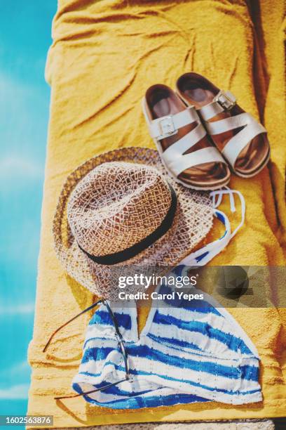 top down view beach accessories on towel - tote bag stock pictures, royalty-free photos & images