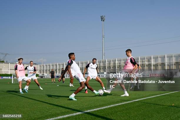 Alex Sandro of Juventus during a training session at JTC on August 16, 2023 in Turin, Italy.