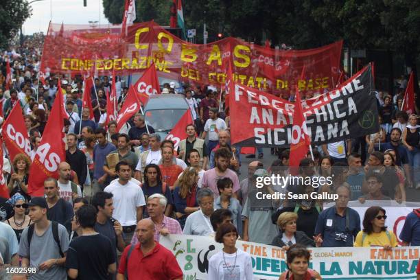 An estimated 30,000 anti-globalization demonstrators stage a protest march July 19, 2001 in Genoa, Italy on the eve of the G8 summit. Although the...