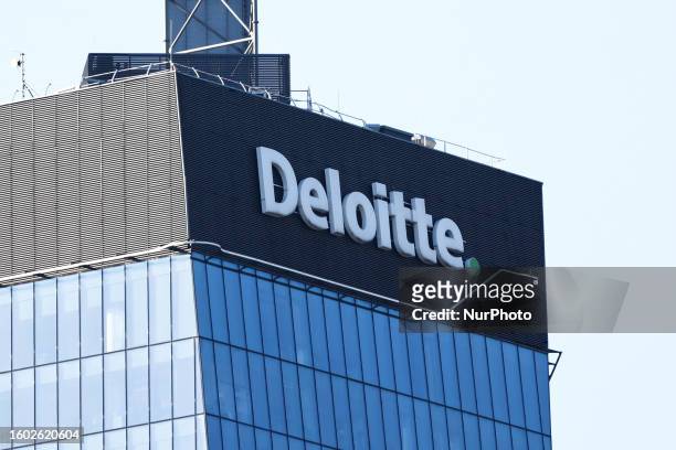 Deloitte is seen on the building in Warsaw, Poland on August 15, 2023.