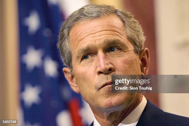 President George W. Bush speaks to the press July 19, 2001 during a joint statement with British Prime Minister Tony Blair at Halton Airbase in...
