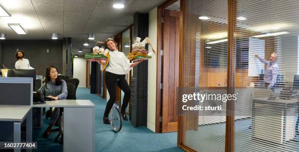 overworked office junior - juggling stock pictures, royalty-free photos & images