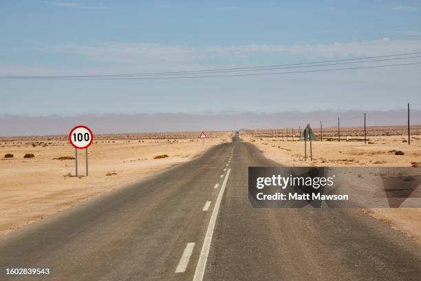 driving in the namibia desert landscape - heat haze car stock pictures, royalty-free photos & images