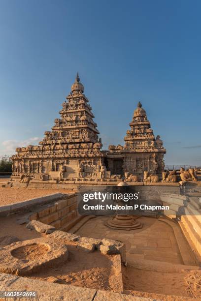 famous dravidian shore temple at sunrise, mahabalipuram (mamallapuram), tamil nadu, india - chennai stock pictures, royalty-free photos & images