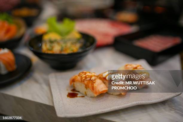 sushi on a plate. - fresh wasabi stock-fotos und bilder