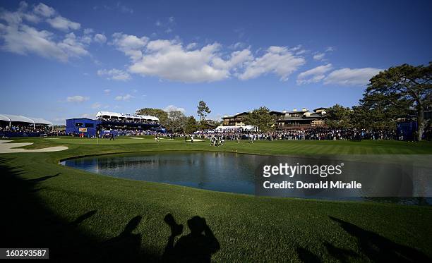 General view of Tiger Woods on the 18th green en route to his -14 under victory during the Final Round at the Farmers Insurance Open at Torrey Pines...