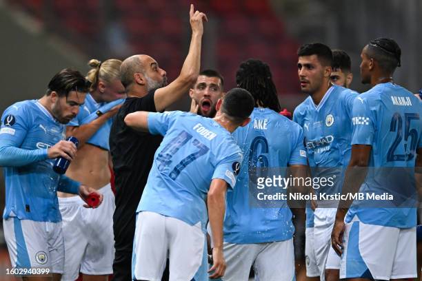 Head Coach Josep Guardiola of Manchester City gives advice to his players during the UEFA Super Cup 2023 match between Manchester City FC and Sevilla...